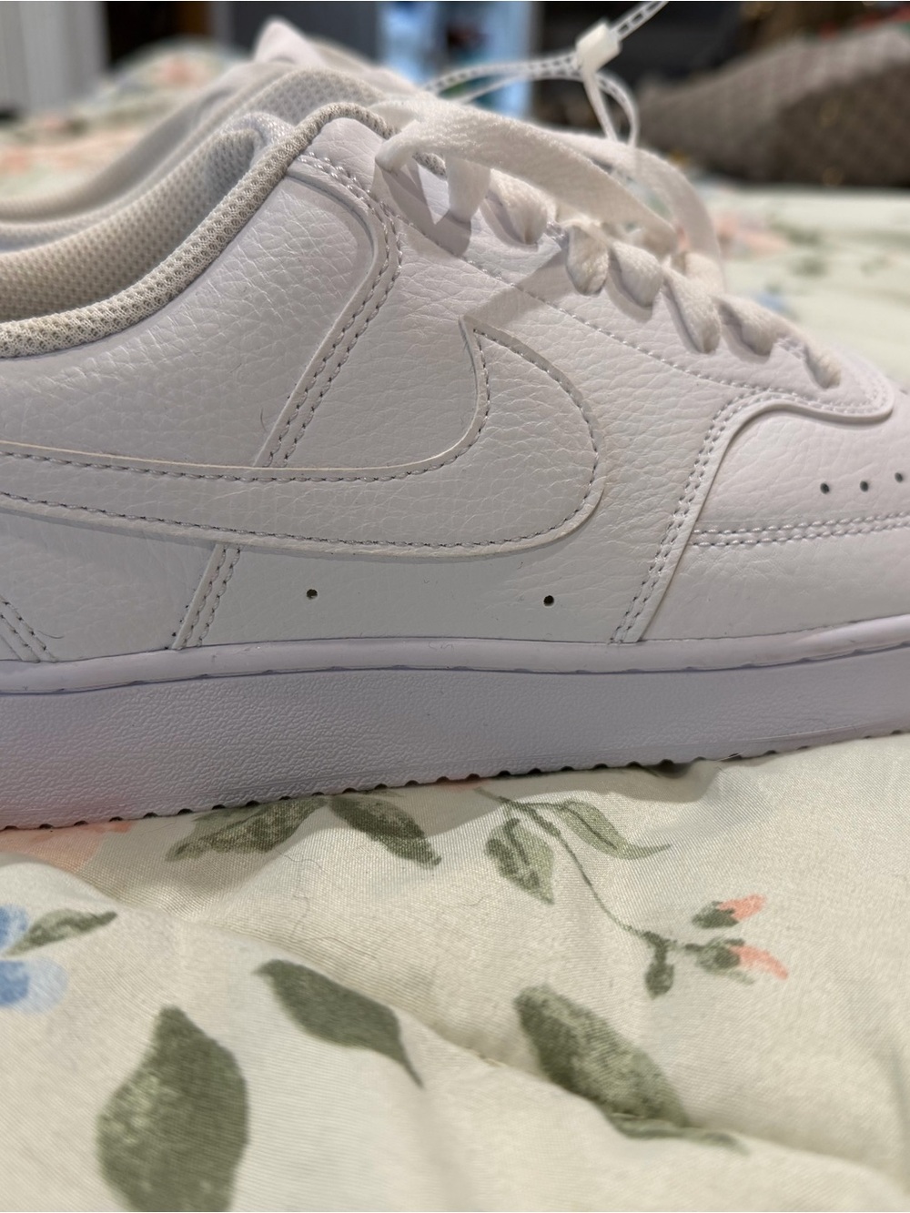 Nike Women’s All-White Leather Sneakers